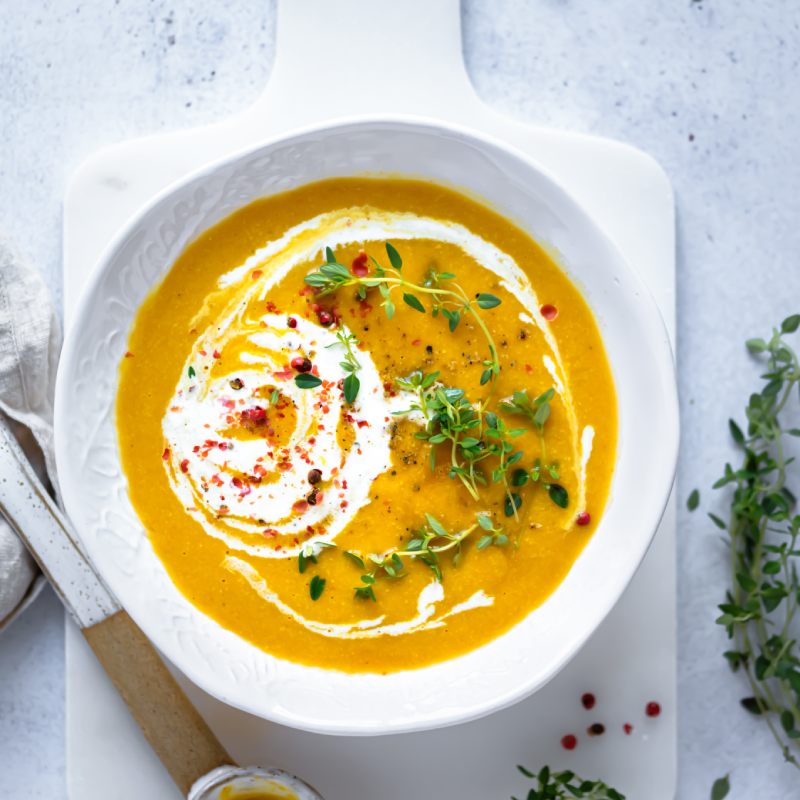 Chef Nathan creamy butternut soup in a bowl, freshly prepared and served